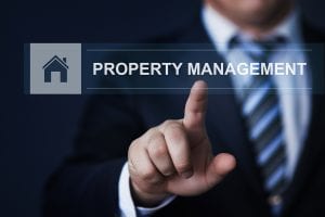 Man searching online about property management and questions for property managers.